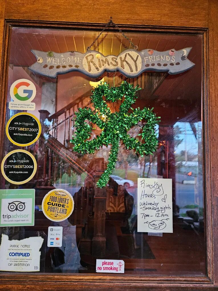 Welcome Rimsky Friends sign and hours posted in the front window